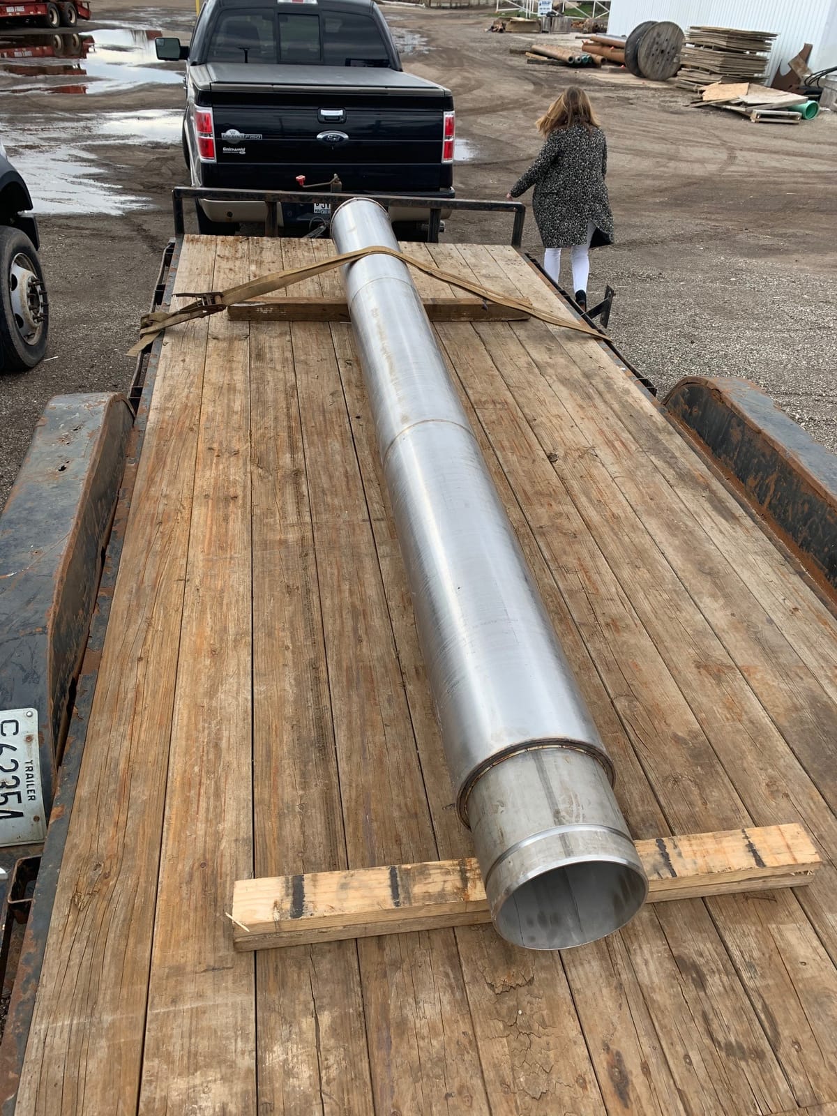 A complete stainless steel flow sleeve assembly fabricated for a submersible pump application.